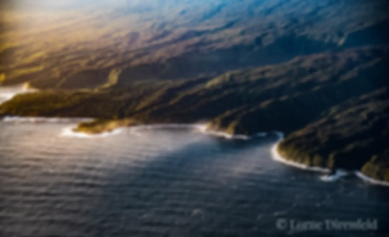 Maui, north shore at sunrise, with the Ke'anae Peninsula glowing . . .