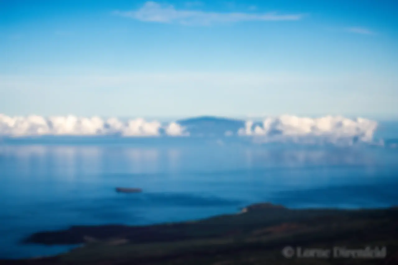 Lanai is in the distance, with Molokini and Makena Big Beach Maui in the foreground . . .