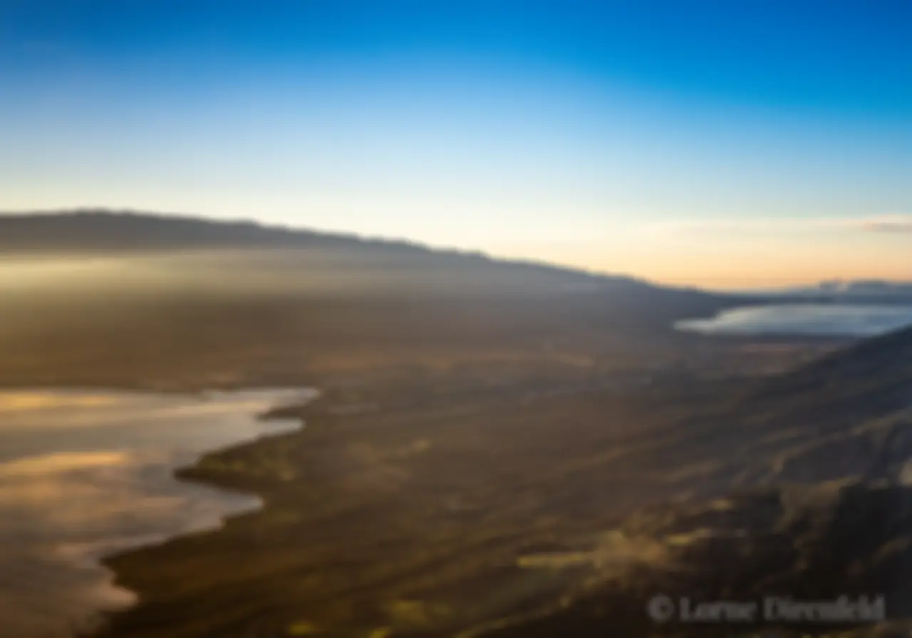 Maui in the morning, looking to the east, across the central valley to Haleakala,  and the north and south shores . . .