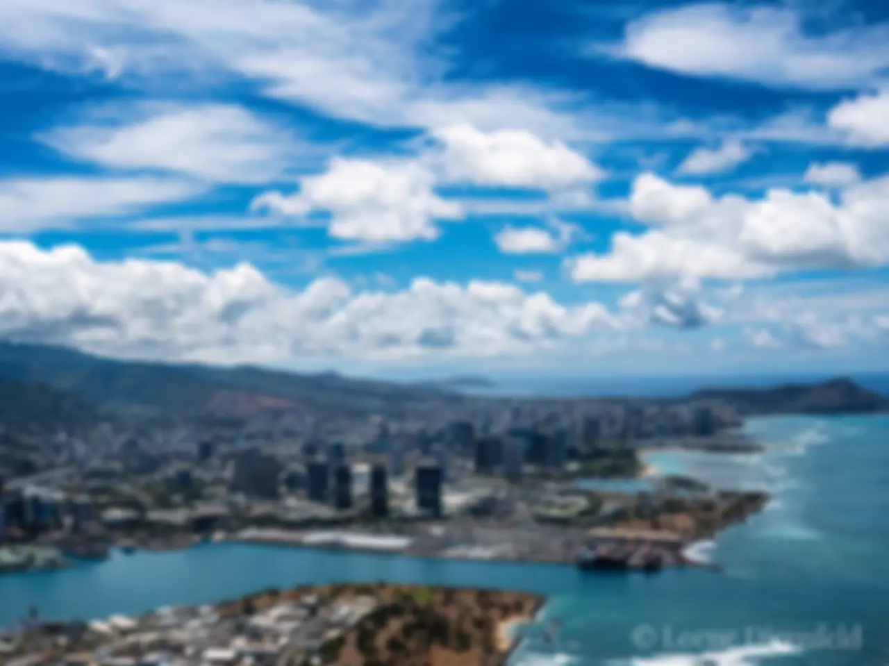 Departing Honolulu airport and looking to the east, beyond the harbor, downtown and Waikiki to Diamond Head . . .