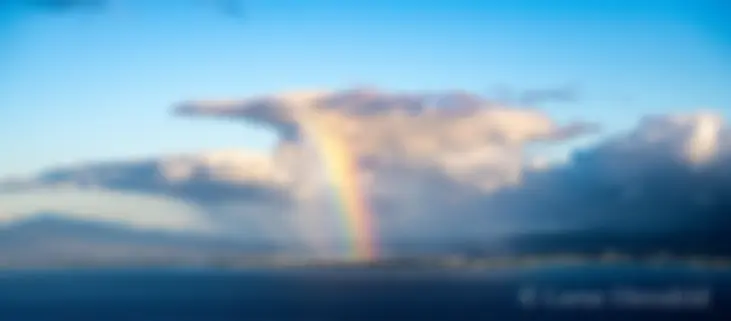 On approach to Honolulu, greeted by a rainbow . . .
