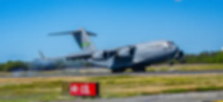 C17 Globemaster III, with Air Mobility Command (AMC), landing, runway 4Right, Honolulu, as we're holding short, waiting to depart from taxiway F . . . Look at all those wheels . . .