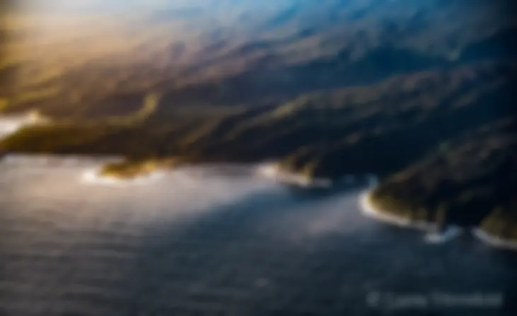Maui, north shore at sunrise, with the Ke'anae Peninsula glowing . . .