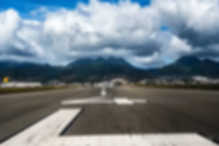 Waiting to depart Runway 4Left Honolulu airport, Ko'olau mountains ahead . . .