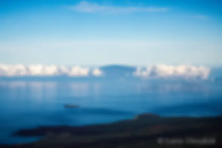 Lanai is in the distance, with Molokini and Makena Big Beach Maui in the foreground . . .