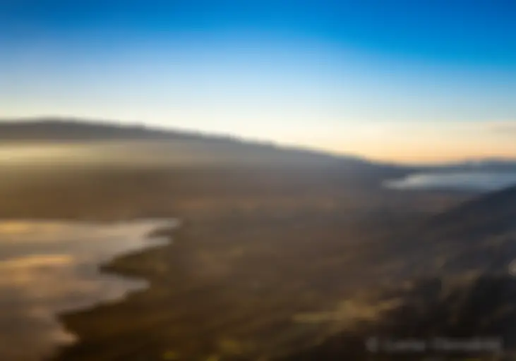 Maui in the morning, looking to the east, across the central valley to Haleakala,  and the north and south shores . . .